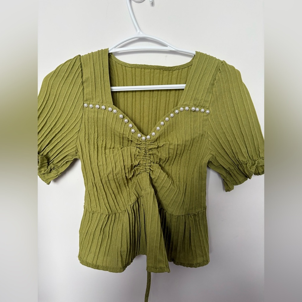 Green top with pearl detail